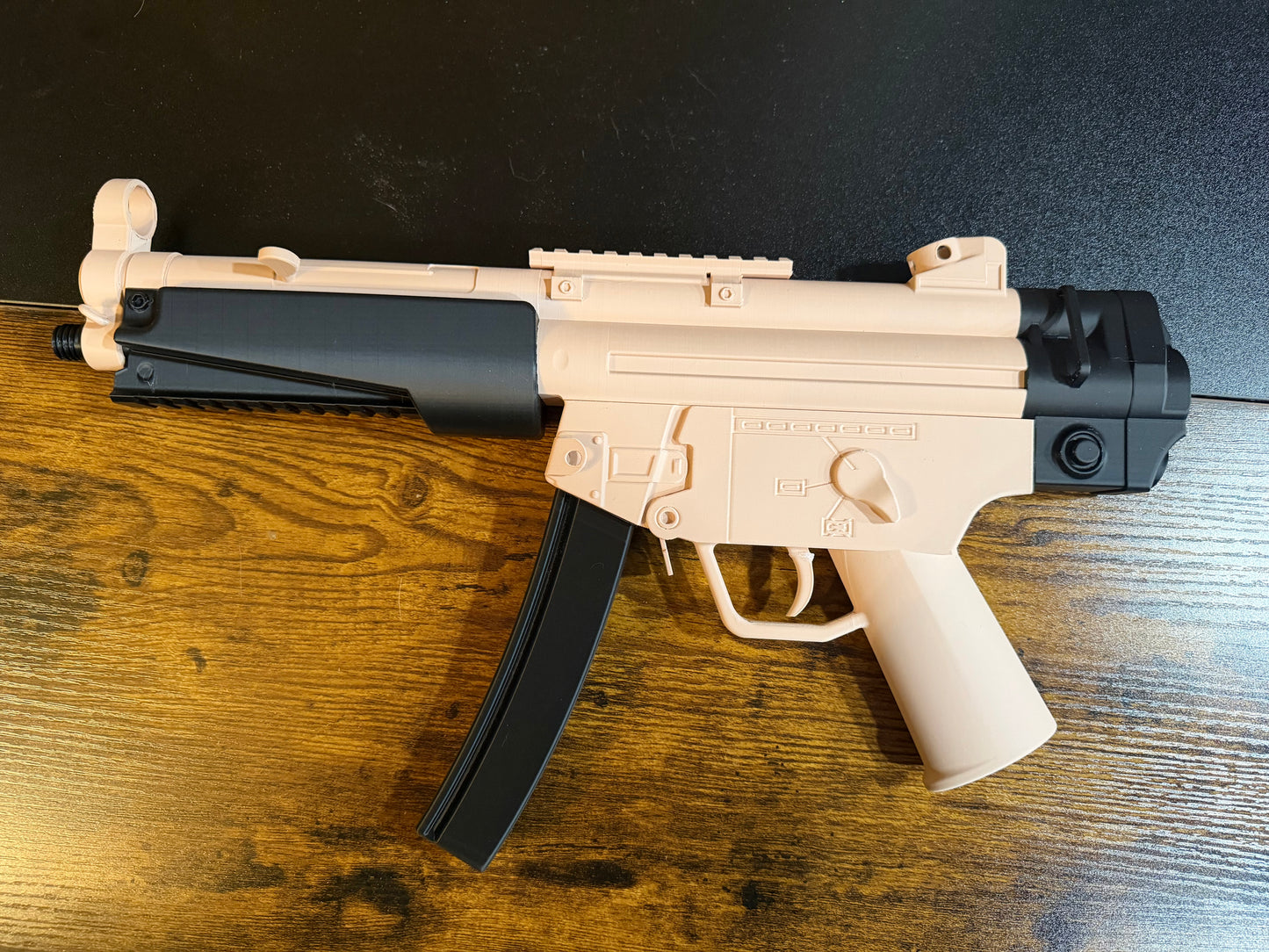 “REPLICA”. Repeat REPLICA MP5s