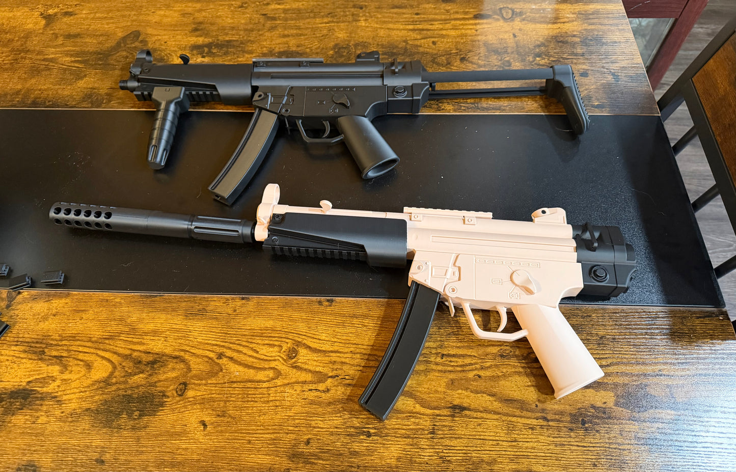 “REPLICA”.  Repeat REPLICA MP5s
