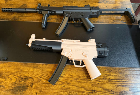 “REPLICA”.  Repeat REPLICA MP5s